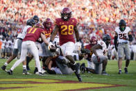 Iowa State running back Breece Hall (28) scores on a 4-yard touchdown run during the second half of an NCAA college football game against Oklahoma State, Saturday, Oct. 23, 2021, in Ames, Iowa. Iowa State won 24-21. (AP Photo/Charlie Neibergall)