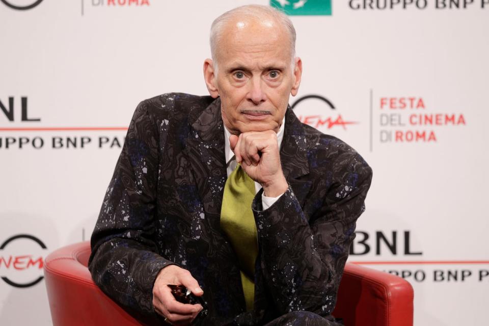 John Waters poses for photographers during a photo call at the Rome Film Fest, in Rome, Saturday, Oct. 17, 2020. (AP Photo/Gregorio Borgia)