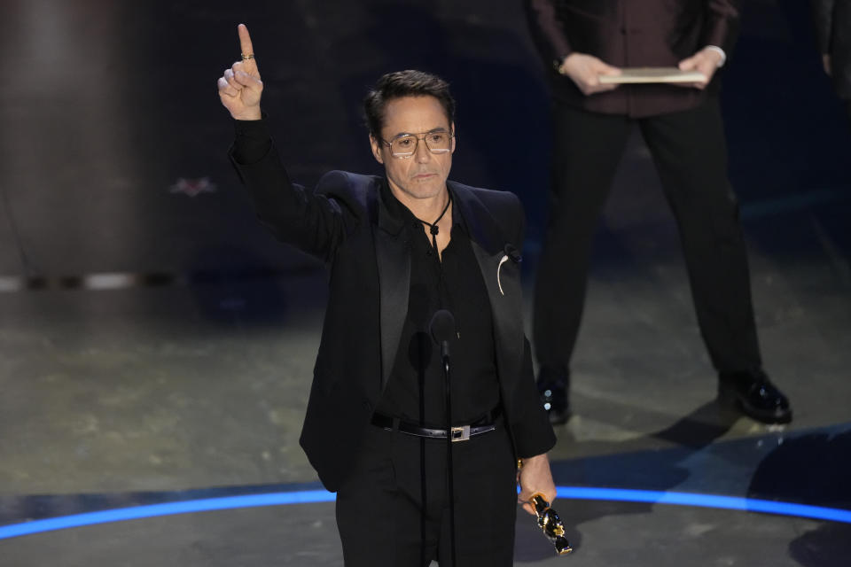 Robert Downey Jr. accepts the award for best performance by an actor in a supporting role for "Oppenheimer" during the Oscars on Sunday, March 10, 2024, at the Dolby Theatre in Los Angeles. (AP Photo/Chris Pizzello)