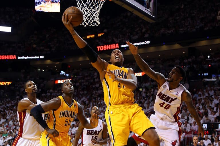 David West of the Indiana Pacers attempts a shot against Udonis Haslem of the Miami Heat on June 3, 2013. The Heat lost to Dallas in the 2011 championship series but defeated Oklahoma City for last year's crown