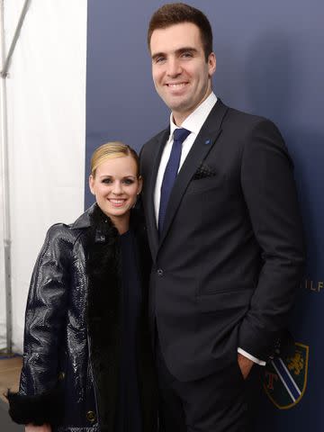 <p>Michael Loccisano/Getty</p> Joe Flacco and his wife Dana Flacco at the Tommy Hilfiger Men's Fall 2013 fashion show during Mercedes-Benz Fashion Week on Feb. 8, 2013 in New York City.