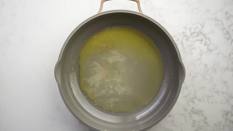 melted butter in saute pan