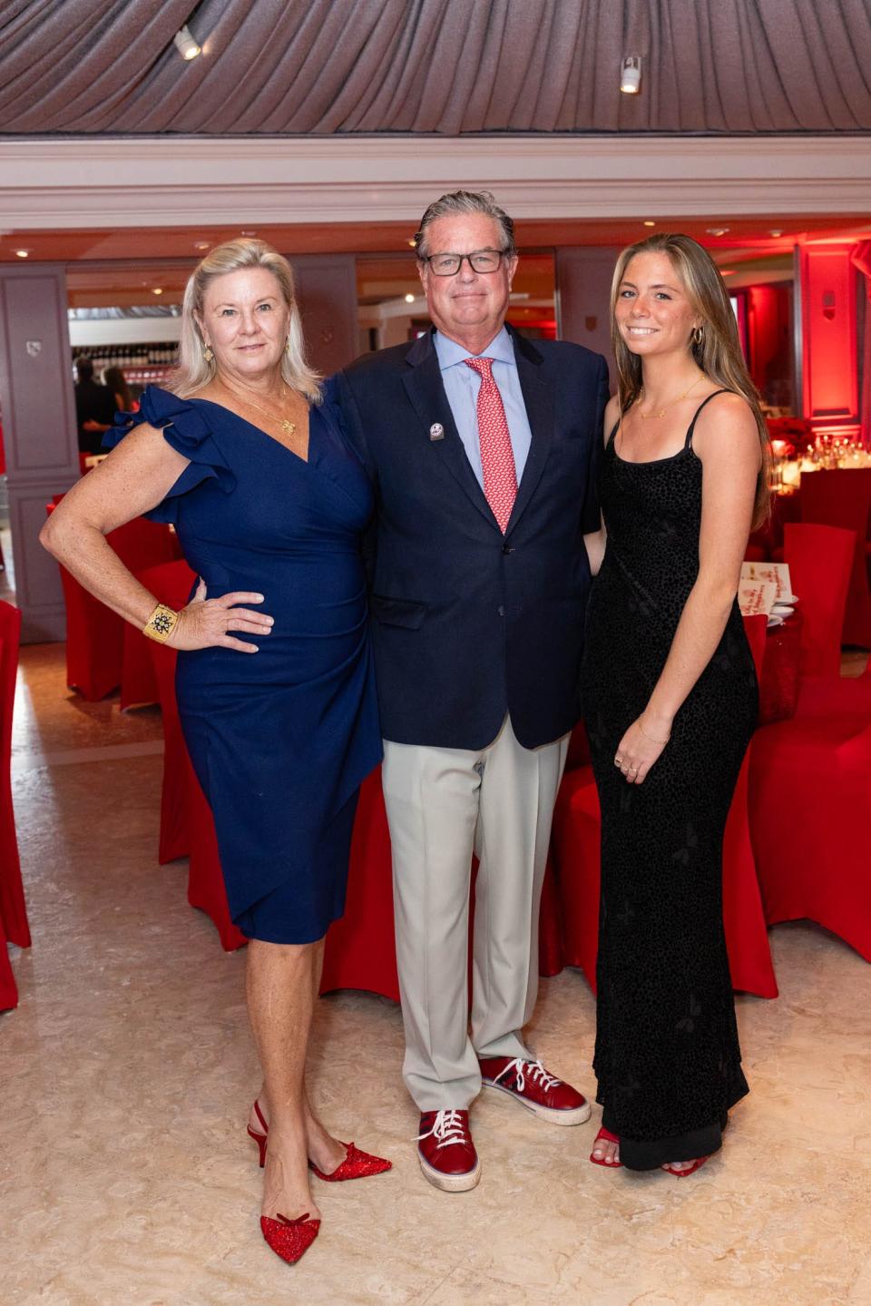 Merrill, Olivia and Robert Debbs at the Red Sneakers for Oakley benefit last November. The 7th annual benefit is set for Nov. 25 at Club Colette.