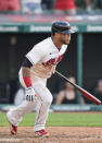 Cleveland Indians' Harold Ramirez watches after hitting against the Seattle Mariners in the 10th inning of a baseball game, Saturday, June 12, 2021, in Cleveland. Ramirez reached first base on a fielder's choice and Cesar Hernandez scored. (AP Photo/Tony Dejak)