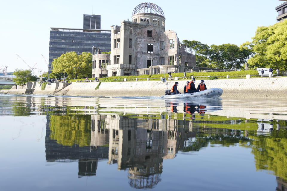 Police officers patrol on the river near the famed Atomic Bomb Dome as Japan's police beef up security ahead of the Group of Seven nations' meetings in Hiroshima, western Japan, Wednesday, May 17, 2023. (AP Photo/Eugene Hoshiko)