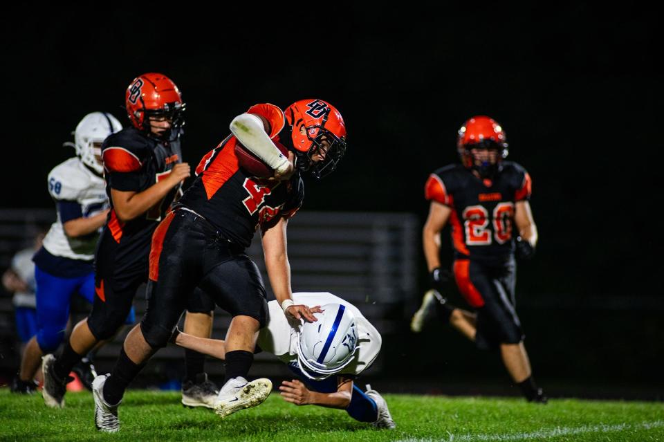 Dover's Mason Meilleur attempts to break a tackle against Haldane during a Sept. 1, 2023 football game.