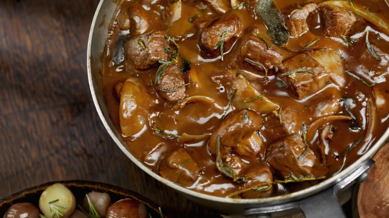 beef bourguignon contained in skillet