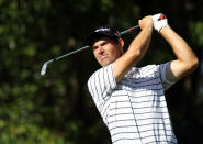 PALM HARBOR, FL - MARCH 16: Padraig Harrington of Ireland plays a shot on the 4th hole during the second round of the Transitions Championship at Innisbrook Resort and Golf Club on March 16, 2012 in Palm Harbor, Florida. (Photo by Sam Greenwood/Getty Images)