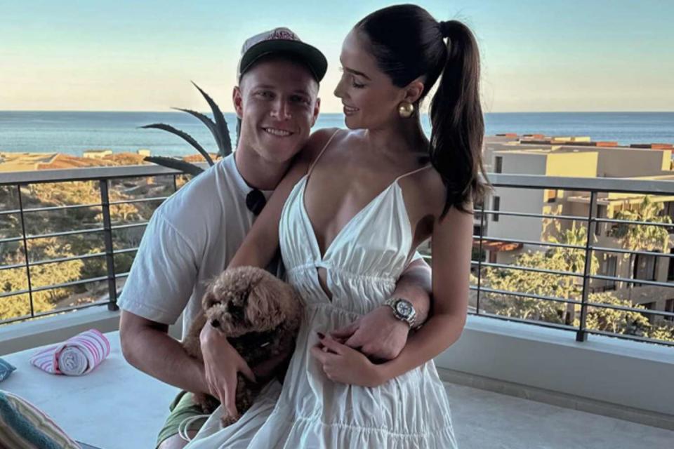 <p>Olivia Culpo/Instagram</p> Christian McCaffrey, Olivia Culpo and their dog Oliver