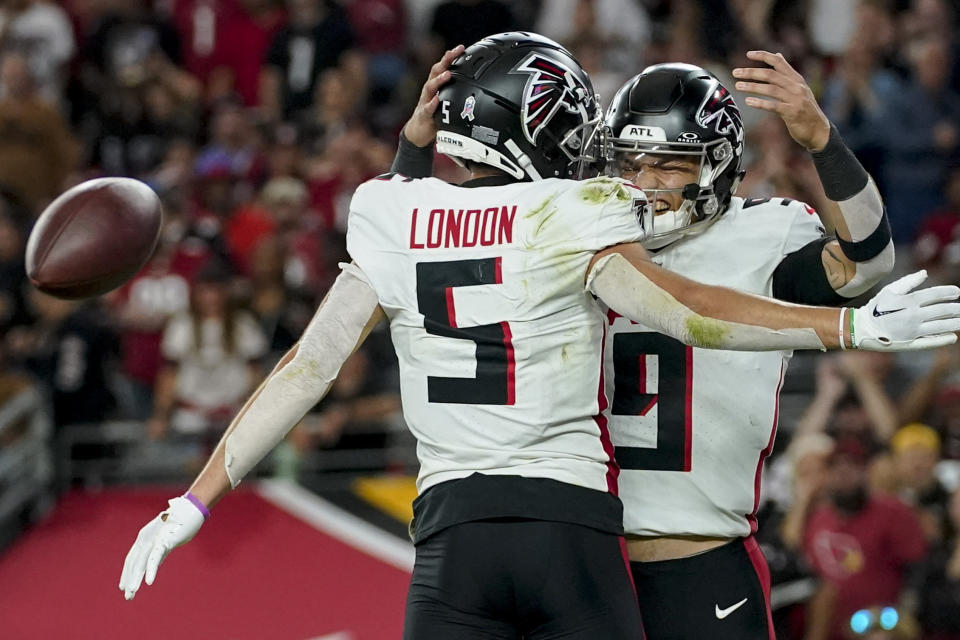 Atlanta Falcons quarterback Desmond Ridder (9) celebrates his touchdown run against the Arizona Cardinals during the second half of an NFL football game, Sunday, Nov. 12, 2023, in Glendale, Ariz. (AP Photo/Matt York)