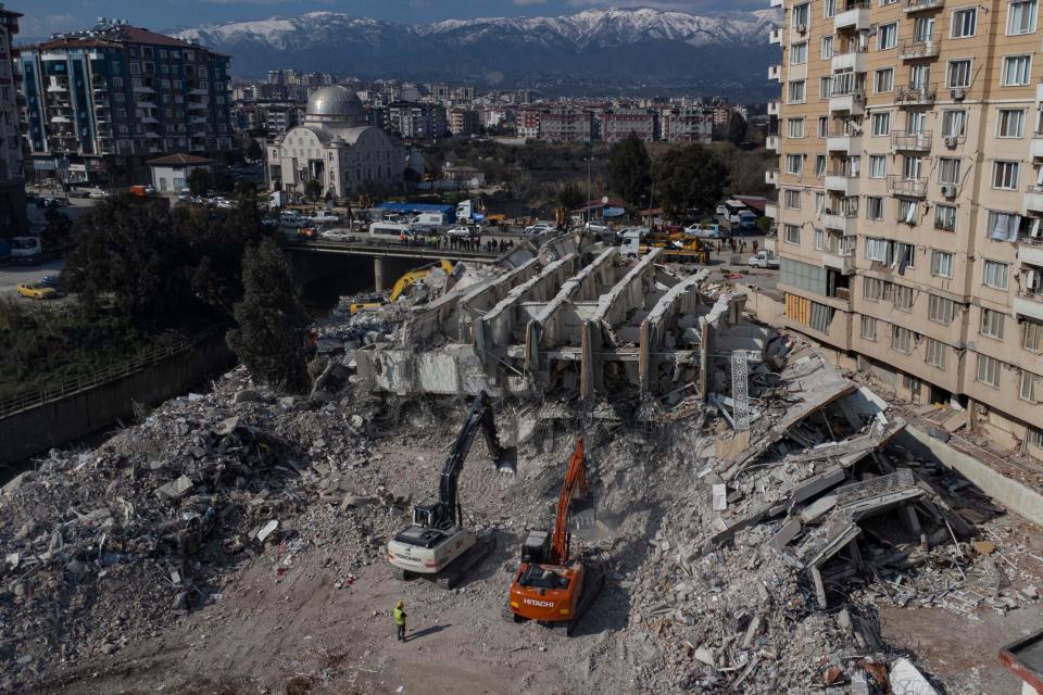 This aerial view shows a collapsed building during an ongoing rescue operation in Hatay, southeastern Turkey, on Feb. 10, 2023.