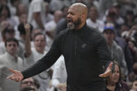 Cleveland Cavaliers coach J.B. Bickerstaff gestures to an official during the first half of Game 3 of the team's NBA basketball second-round playoff series against the Boston Celtics, Saturday, May 11, 2024, in Cleveland. (AP Photo/Sue Ogrocki)