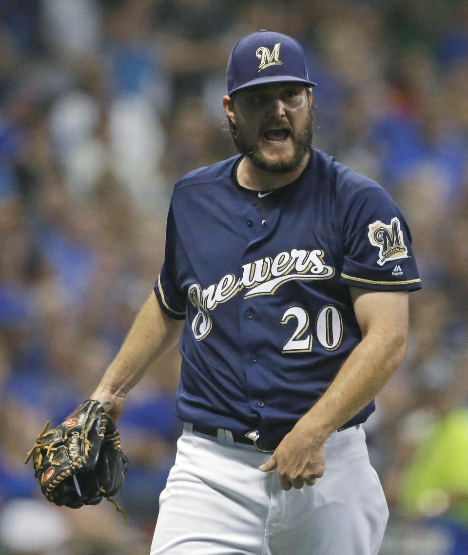 Milwaukee Brewers pitcher Wade Miley reacts during the sixth inning of the team's baseball game against the Chicago Cubs on Tuesday, Sept. 4, 2018, in Milwaukee. (AP Photo/Aaron Gash)