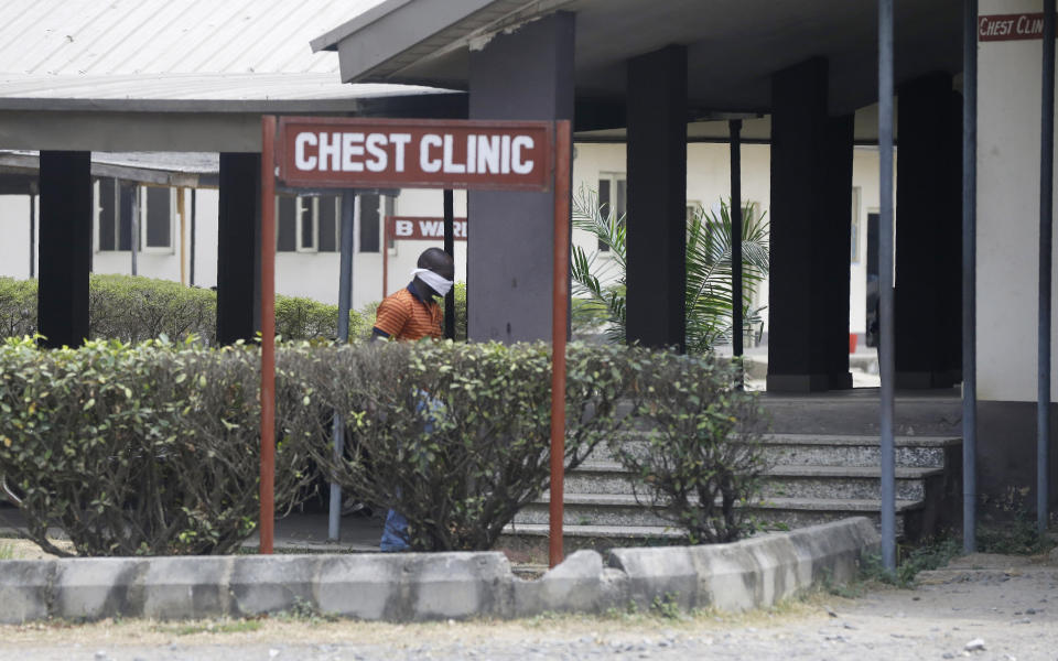 A man wearing face mask walks at the Yaba Mainland hospital, where an Italian citizen who entered Nigeria on Tuesday from Milan on a business trip, the first case of the COVID-19 virus is being treated in Lagos Nigeria Friday, Feb. 28, 2020. Nigeria's health authorities have reported the country's first case of a new coronavirus in Lagos, the first confirmed appearance of the disease in sub-Saharan Africa. (Photo/ Sunday Alamba)