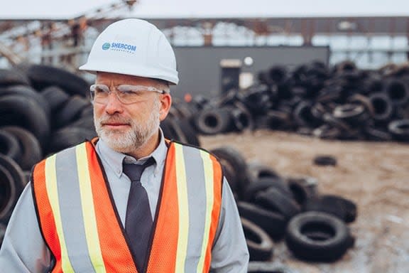 Shane Olson, founder and owner of Shercom, says he still has questions about how the province's tire stewardship organization handled a contract it awarded to a California tire processor in 2022. (Shercom/Facebook - image credit)