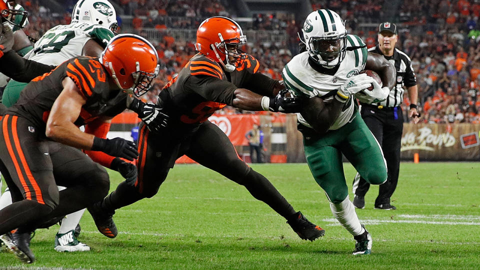 Isaiah Crowell carries the ball over for a touchdown. (Photo by Joe Robbins/Getty Images)