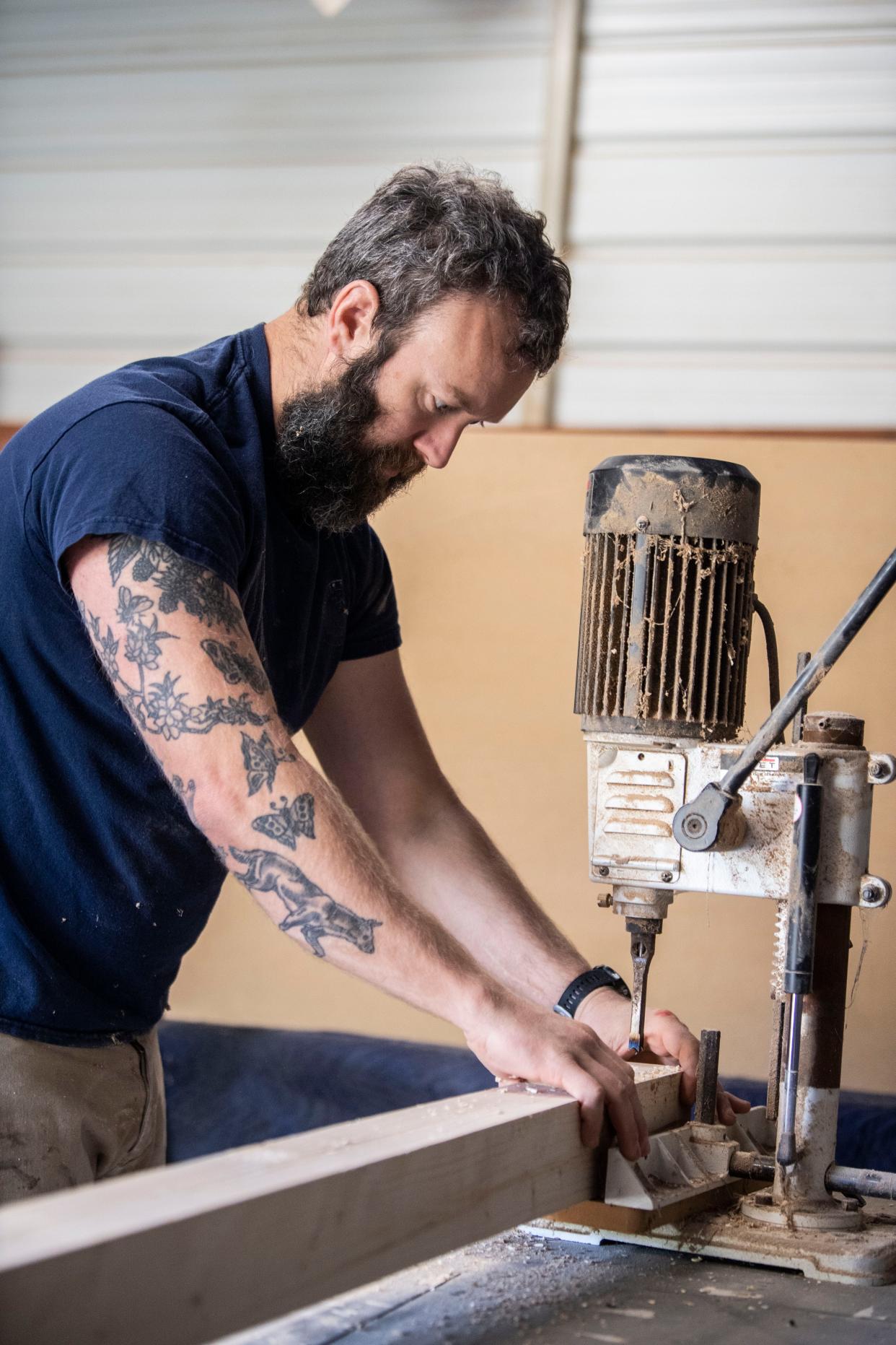 Woodworker Shelton Slack works in his shop in Nashville.