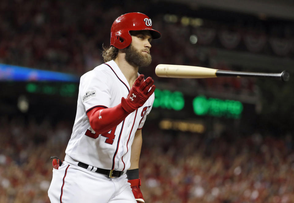 Washington Nationals’ Bryce Harper flips the bat after hitting his two-run home run in the eighth inning in Game 2 of baseball’s National League Division Series against the Chicago Cubs, at Nationals Park, Saturday, Oct. 7, 2017, in Washington. (AP)