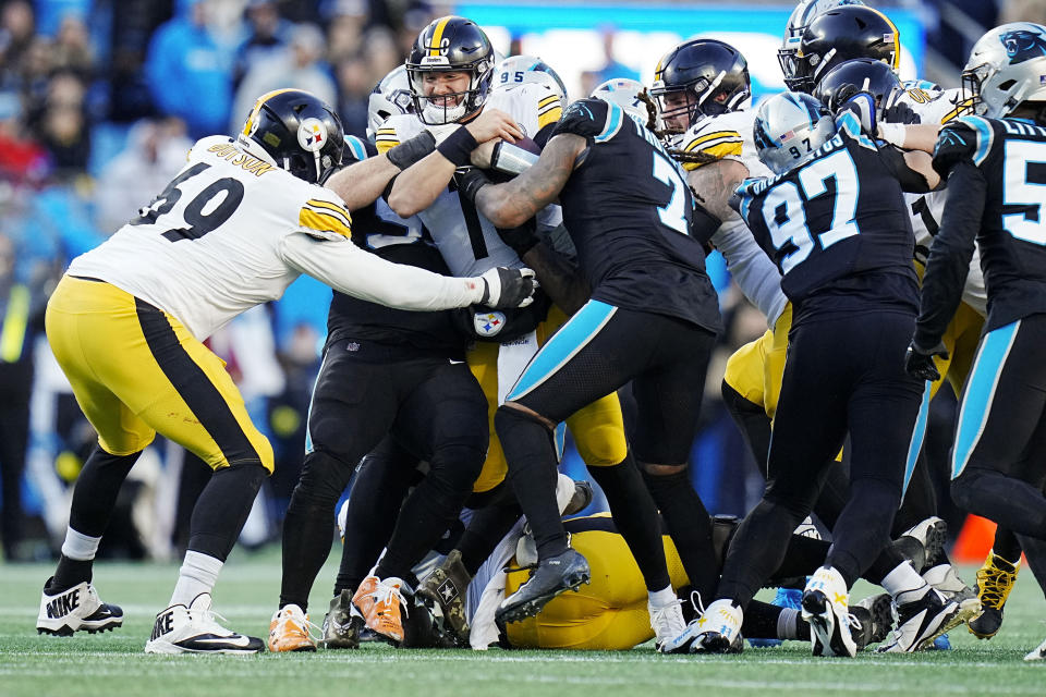 Pittsburgh Steelers quarterback Mitch Trubisky runs during the second half of an NFL football game between the Carolina Panthers and the Pittsburgh Steelers on Sunday, Dec. 18, 2022, in Charlotte, N.C. (AP Photo/Rusty Jones)