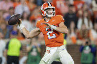 FILE - Clemson quarterback Cade Klubnik (2) plays against North Carolina during an NCAA college football game Saturday, Nov. 18, 2023, in Clemson, S.C. Clemson's offense is searching for playmakers this season after a year when the team's mistakes had them at 4-4 and out of ACC title contention by the end of October. The Tigers rallied for five straight victories, but don't want to dig a similar hole this season. (AP Photo/Jacob Kupferman, File)