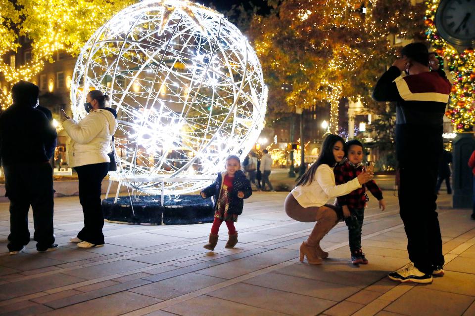 Families enjoyed taking photos of the holiday lights at San Jacinto Plaza during El Paso's WinterFest 2020.