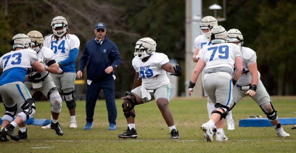 The University of West Florida linemen run through a series of drills during practice on Thursday, Feb. 29, 2024.