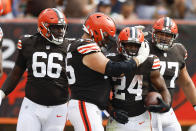 The Cleveland Browns celebrate after running back Nick Chubb (24) scored a touchdown against the New York Jets during the second half of an NFL football game, Sunday, Sept. 18, 2022, in Cleveland. (AP Photo/Ron Schwane)
