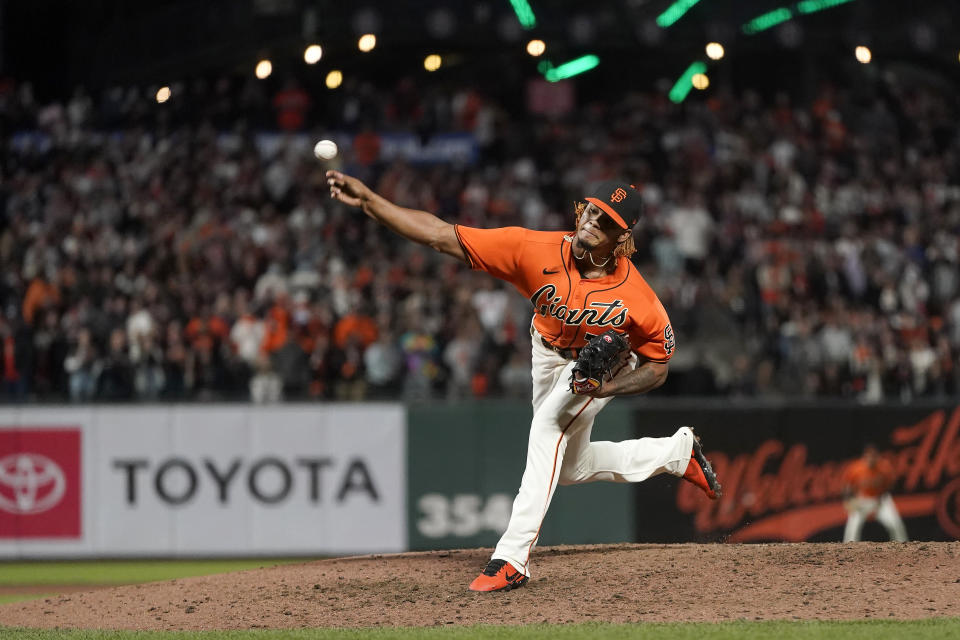 San Francisco Giants' Camilo Doval pitches against the San Diego Padres during the ninth inning of a baseball game in San Francisco, Friday, Oct. 1, 2021. (AP Photo/Jeff Chiu)