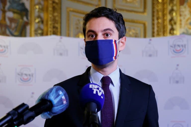 Gabriel Attal, porte-parole du gouvernement lors d'une conférence de presse, le 17 décembre 2020 à Paris - Thomas SAMSON © 2019 AFP