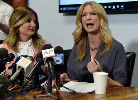 Radio-TV personality Wendy Walsh (R) speaks with reporters alongside her attorney, Lisa Bloom, to discuss her allegations of sexual harassment by Fox News host Bill O'Reilly, during a news conference in Los Angeles, California, U.S., April 3, 2017. REUTERS/Kevork Djansezian