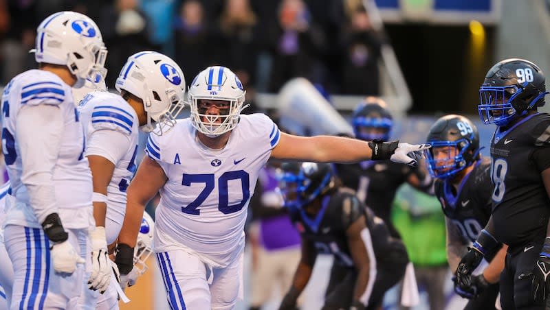 BYU offensive lineman Connor Pay (70) calls out protection assignments against Boise State in the first half of an NCAA college football game, Saturday, Nov. 5, 2022, in Boise, Idaho. BYU won 31-28. Steve Conner, Associated Press