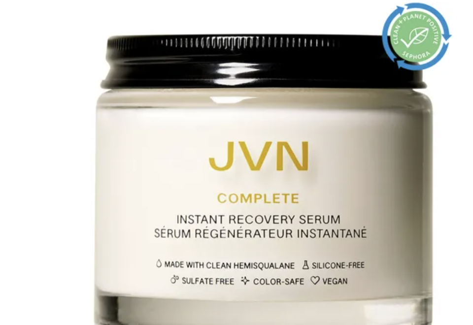 JVN Complete Instant Recovery Heat Protectant Leave-In Serum in a glass container with black lid.