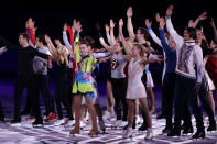 Skaters, including Adelina Sotnikova of Russia, centre, perform during the figure skating exhibition gala finale at the Iceberg Skating Palace during the 2014 Winter Olympics, Saturday, Feb. 22, 2014, in Sochi, Russia. (AP Photo/Bernat Armangue)