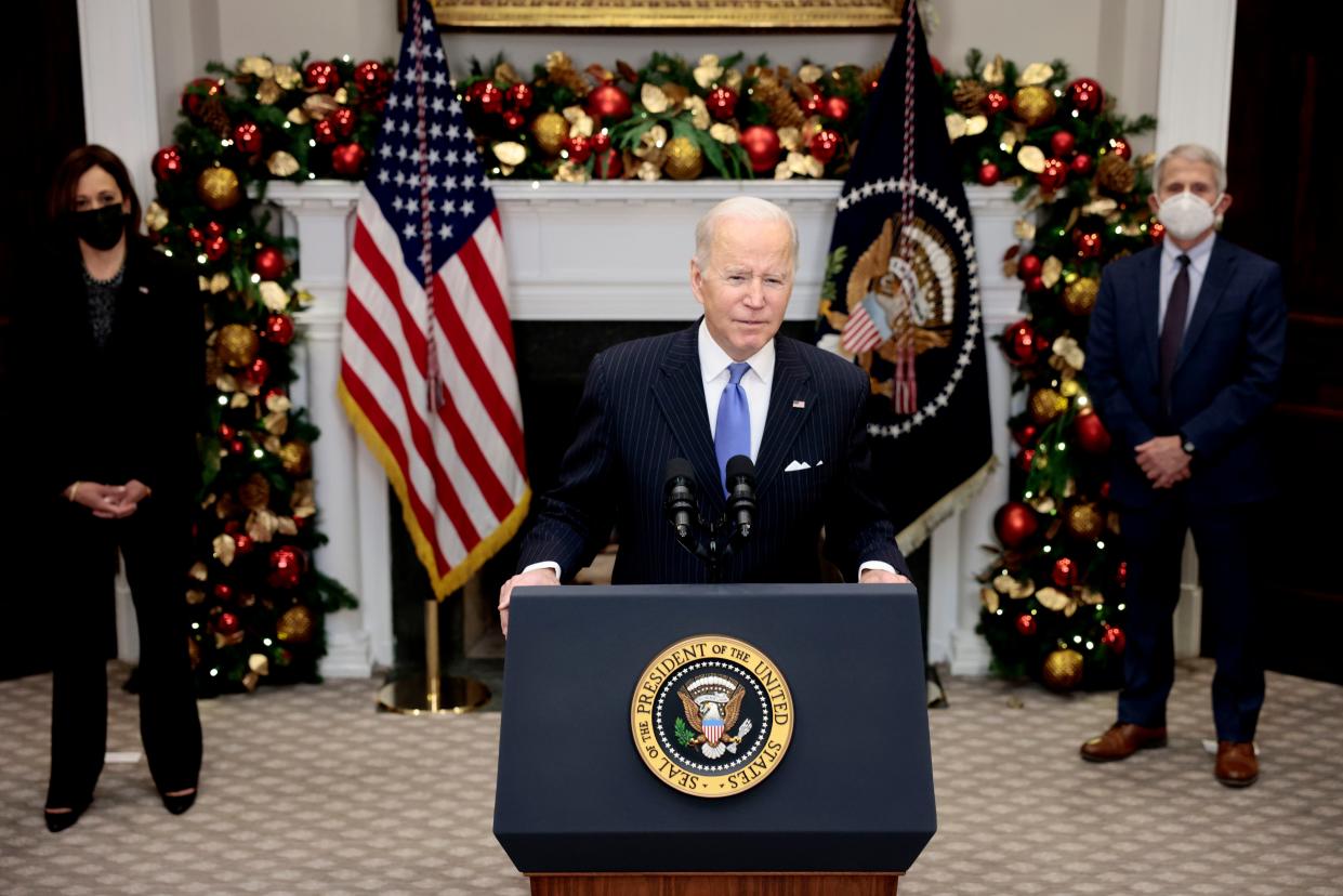 U.S. President Joe Biden delivers remarks on the Omicron COVID-19 variant following a meeting with his COVID-19 response team, including U.S. Vice President Kamala Harris (L) and Anthony Fauci (R), Director of the National Institute of Allergy and Infectious Diseases and Chief Medical Advisor to the President, at the White House on Nov. 29, 2021, in Washington, DC.