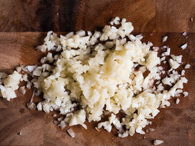 <p>Serious Eats / Daniel Gritzer</p> Knife-minced garlic.