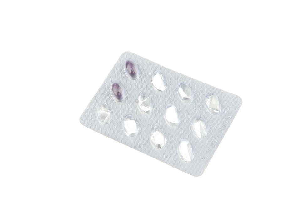 sealed packaging drug tablet on a white background