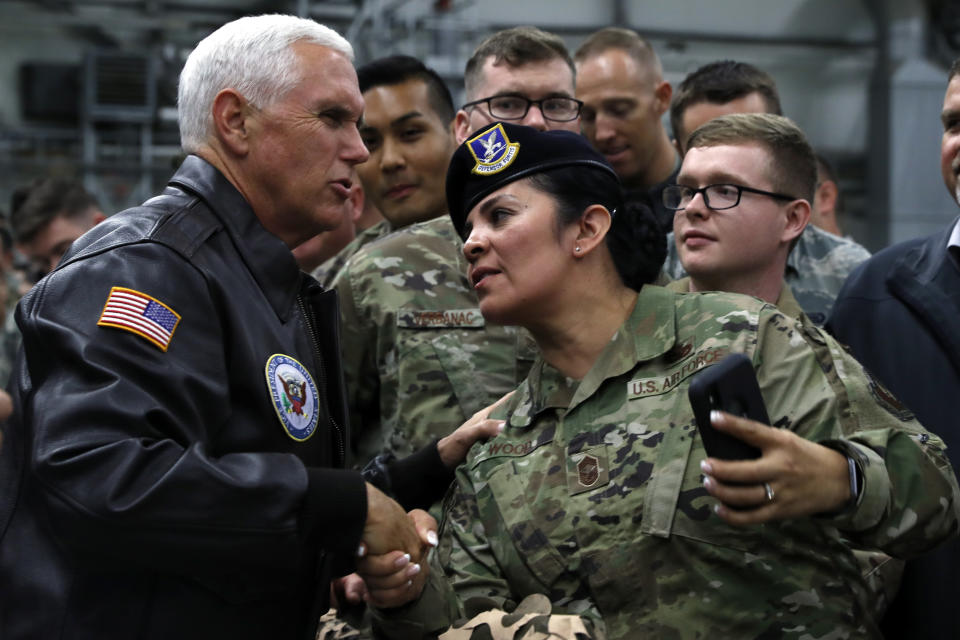 Vice President Mike Pence greets U.S. troops after speaking at Ramstein Air Force Base, Germany, Friday, Oct. 18, 2019. (AP Photo/Jacquelyn Martin)