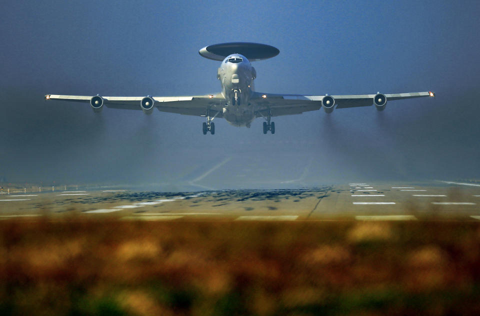 A Nato AWACS plane takes off the NATO Airbase in Geilenkirchen, Germany, Wednesday, March 12, 2014. AWACS planes flying out of Geilenkirchen to patrol over Romania and Poland. (AP Photo/Frank Augstein)