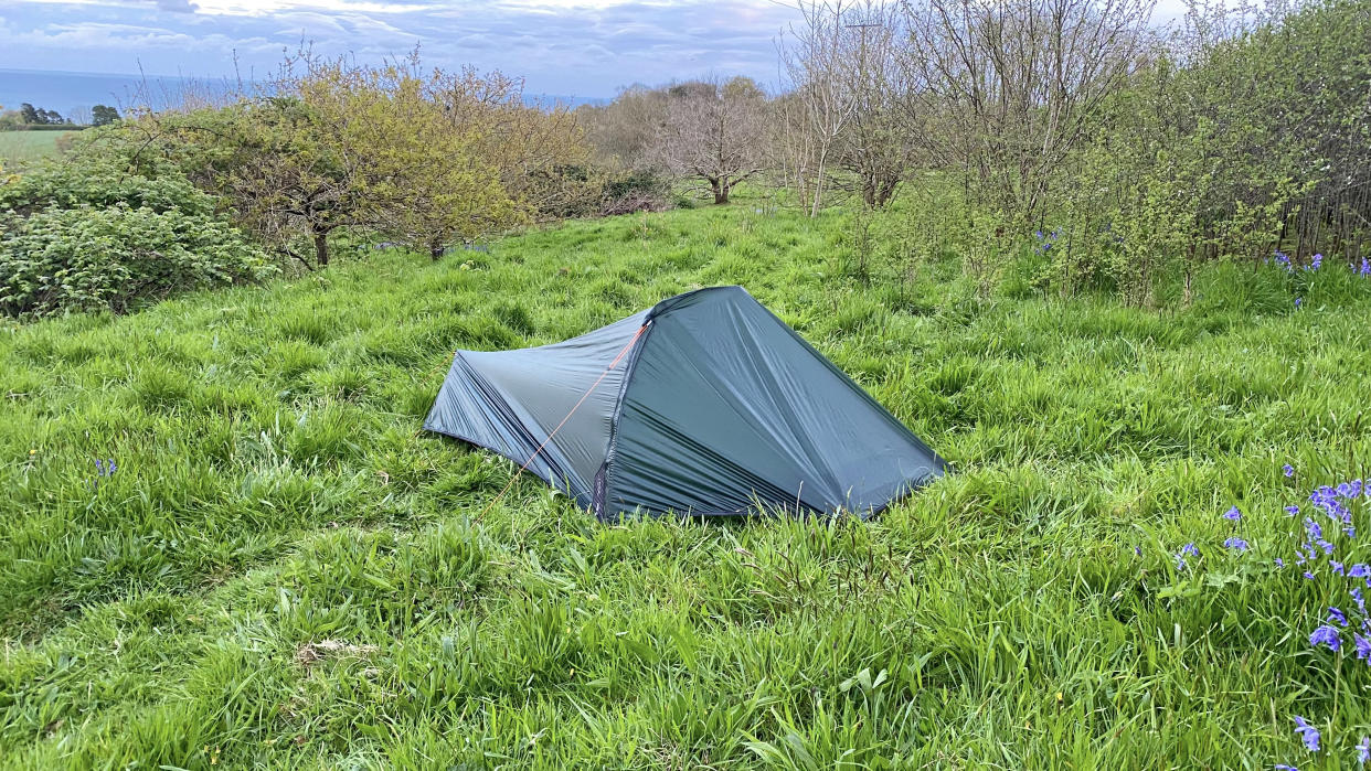  Vango F10 Neon UL1 review: tent set up in a field. 