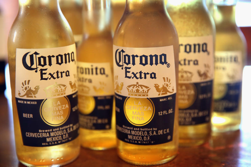 CHICAGO, IL - JUNE 07:  In this photo illustration, bottles of Corona beer are shown on June 7, 2013 in Chicago, Illinois.  Constellation Brands, one of the world's largest wine companies, is expected to become the third-largest beer supplier in the United State today with a $5.3 billion purchase of the U.S. distribution rights of Grupo Modelo beers from Anheuser Busch InBev. Corona Extra, brewed by Grupo Modelo, is the number one selling imported beer sold in the United States and the number six selling beer overall.  (Photo Illustration by Scott Olson/Getty Images)