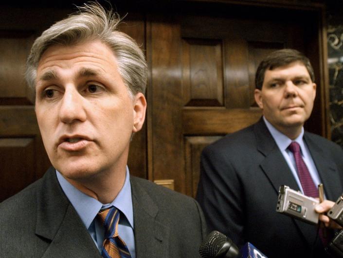 FILE - In this March 26, 2004 file photo, then-California State Assembly Minority Leader Kevin McCarthy, R-Bakersfield, left, talks to reporters after a meeting with Gov. Arnold Schwarzenegger in Sacramento, Calif. McCarthy, the majority leader who’s favored to become the next speaker of the House, has energetically nurtured GOP legislators in the House since he was elected to Congress nine years ago. (AP Photo/Steve Yeater, File)