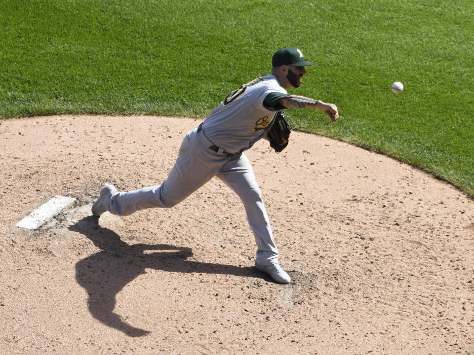 Oakland Athletics starting pitcher Mike Fiers throws against the Chicago White Sox during the sixth inning of a baseball game, Friday, Aug. 9, 2019, in Chicago. (AP Photo/David Banks)