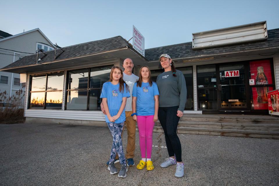 Jon and Sarah Gozzo pose with their twins, Maeve and Lyona in front of their new Secret Spot eatery location at 590 High Street. Their original location next door was destroyed by a fire on August 19, 2022.