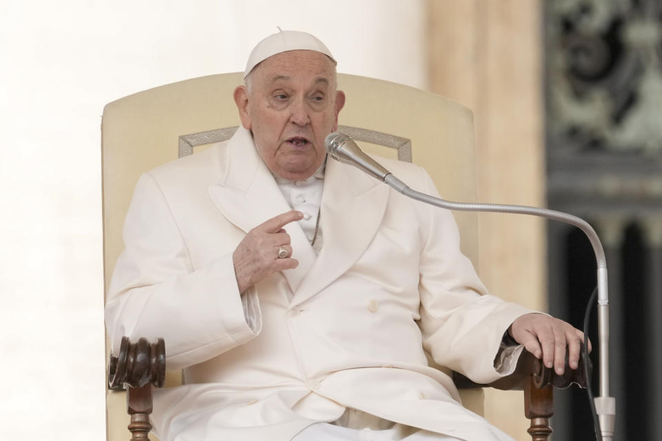 Pope Francis delivers his speech during his weekly general audience in the St. Peter's Square at the Vatican, Wednesday, March 13, 2024. Pope Francis says he has no plans to resign and isn’t suffering from any health problems that would require doing so, saying in a new memoir he still has “many projects to bring to fruition.” Francis, 87, made the comments in an autobiography, “Life: My Story Through History,” which is being published Tuesday, March 19, 2024, the 11th anniversary of his installation as pope. (AP Photo/Andrew Medichini)