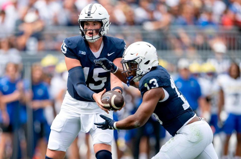 Penn State quarterback Drew Allar hands off to running back Kaytron Allen during the game against Delaware on Saturday, Sept. 9, 2023.