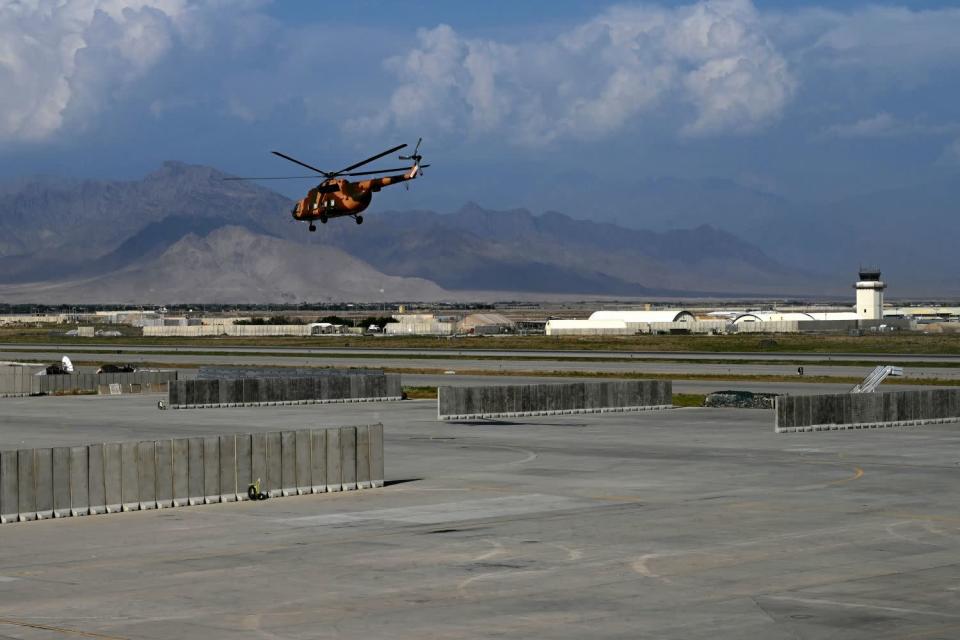 An Afghan helicopter takes off at the Bagram air base.