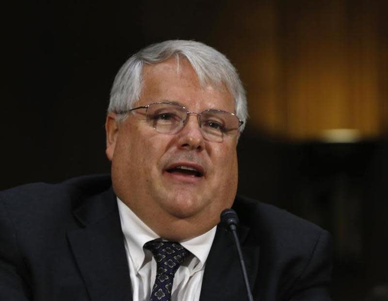 Apple's CFO Peter Oppenheimer appears before a Senate homeland security and governmental affairs investigations subcommittee hearing on offshore profit shifting and the U.S. tax code, on Capitol Hill in Washington, May 21, 2013. REUTERS/Jason Reed/Files