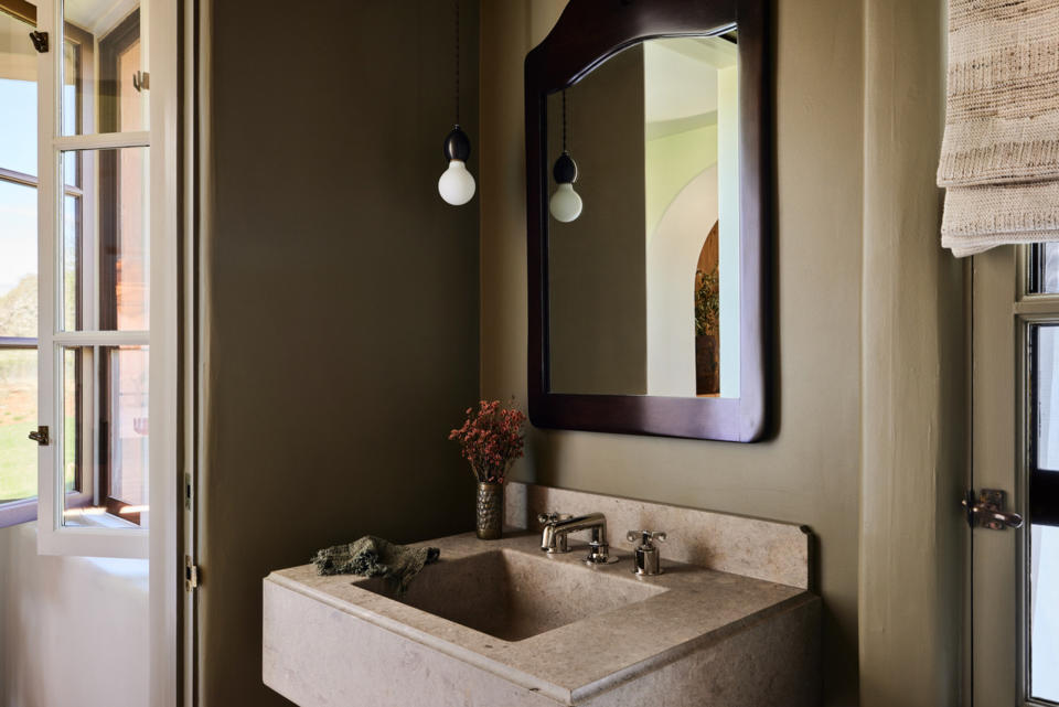 A bathroom with polished nickel hardware