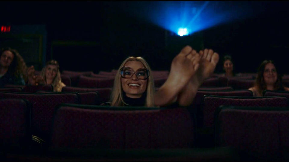 Margot Robbie feet on seat Once Upon A Time In Hollywood.