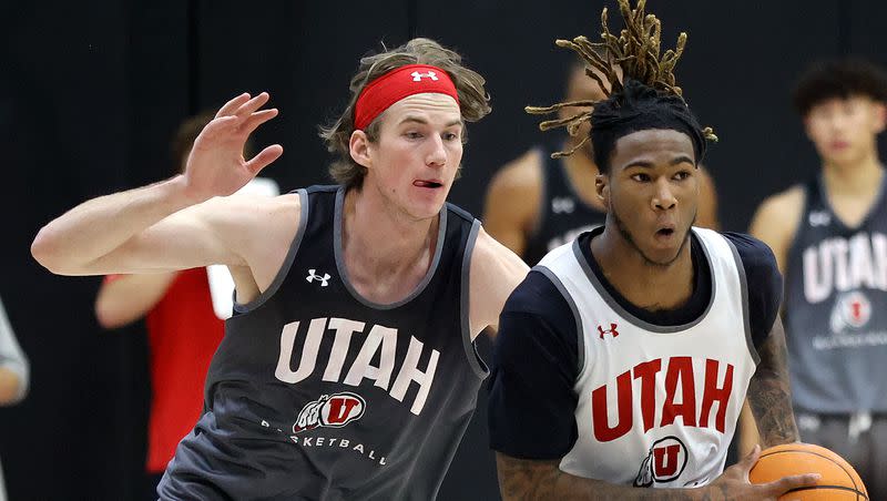Branden Carlson, left, and Deivon Smith practice with the Utah Runnin’ Utes at the Jon M. and Karen Huntsman Basketball Facility in Salt Lake City on Tuesday, Sept. 26, 2023.